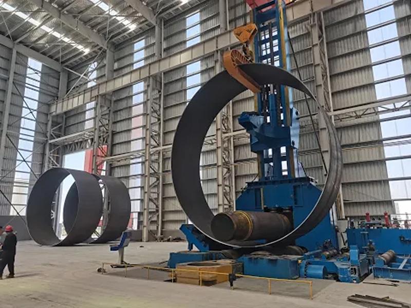 Gia công uốn lốc cuốn cuộn sắt thép tấm thành ống