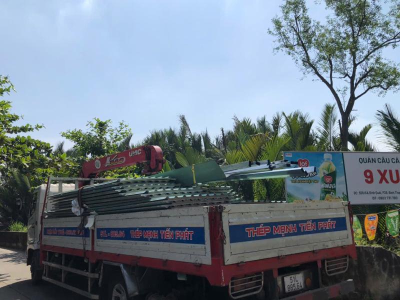 Giao 72 tấm tôn PU màu xanh ngọc dày 5dem cán 9 sóng vuông cho công trình tại Bình Quới, Bình Thạnh